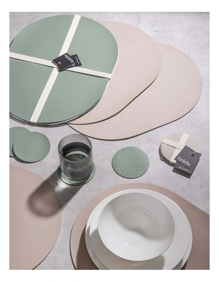 Hugo sage placemats styled with tableware