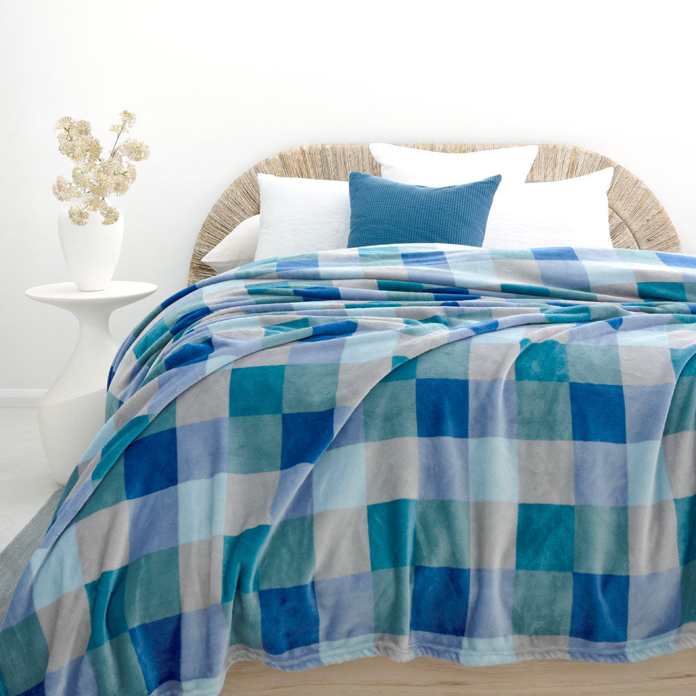 Bambury Charlie Ultraplush Blanket Ocean - styled on bed