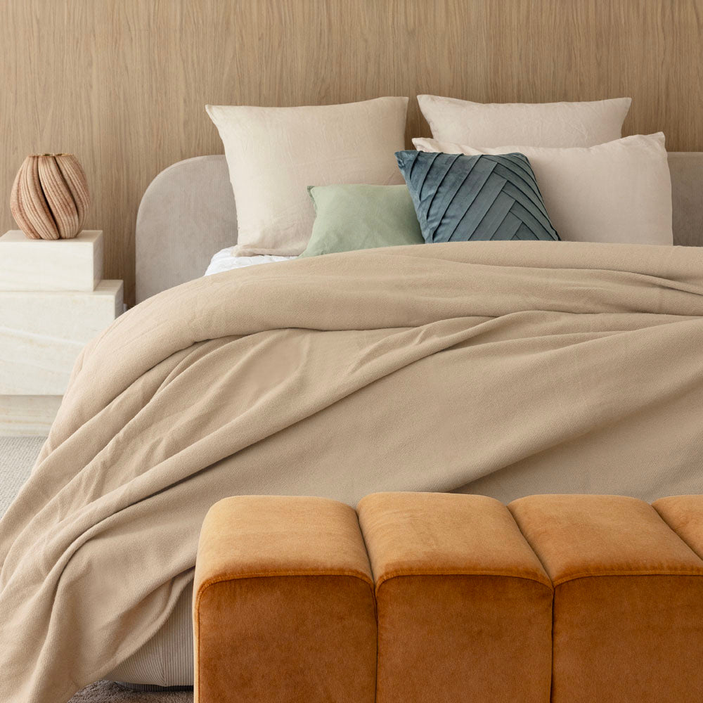 Bambury Carson Wool Bamboo Blanket Latte - styled on bed