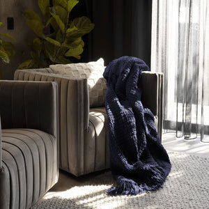 Bambury Asha Chenille Throw Navy - lifestyle on sofa