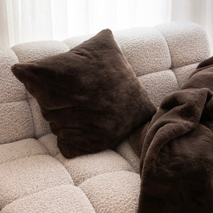 Bambury Frida Faux Fur Cushion Chocolate - styled on sofa