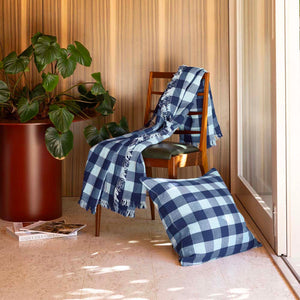 Bambury Willow Gingham Square Cushion Blue styled lifestyle shot - gingham cushion