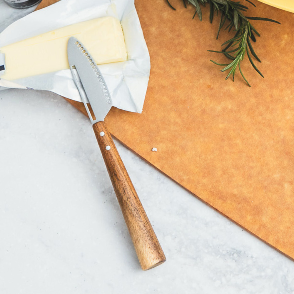 Prepara butter knife acacia wood handle close-up — double rivet design