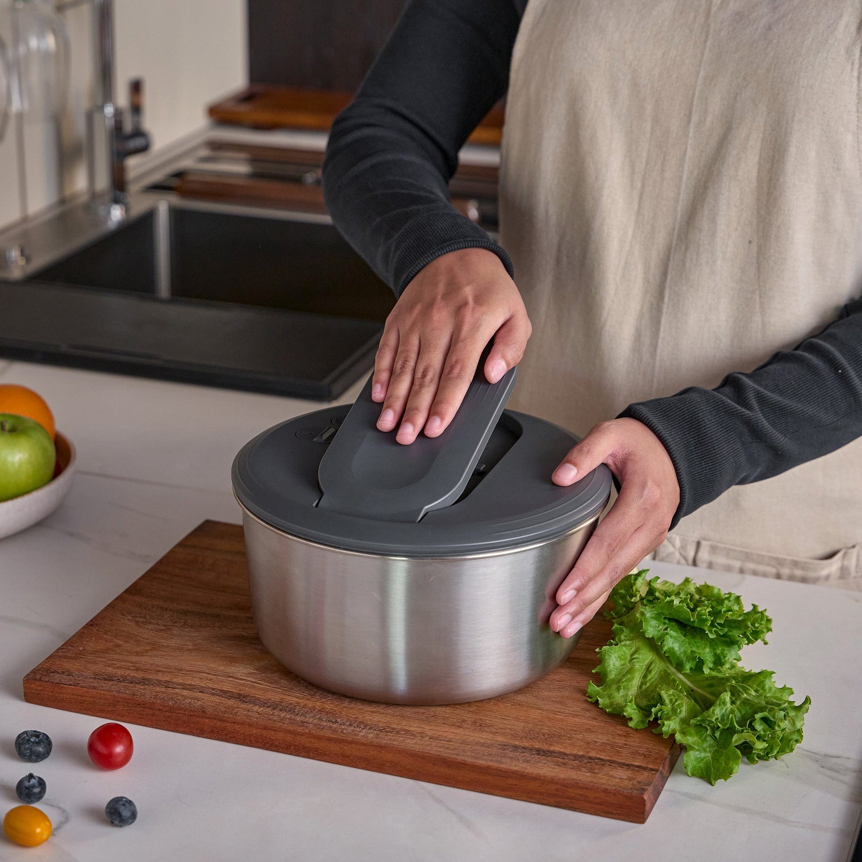 Zyliss Swift Dry Salad Spinner Large Stainless Steel in use - pump action drying