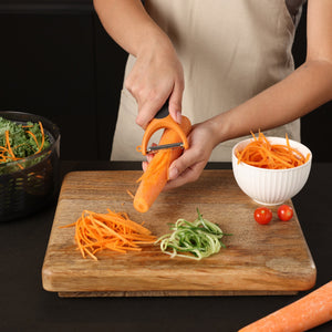 Zyliss Julienne Y Peeler in use shredding carrot