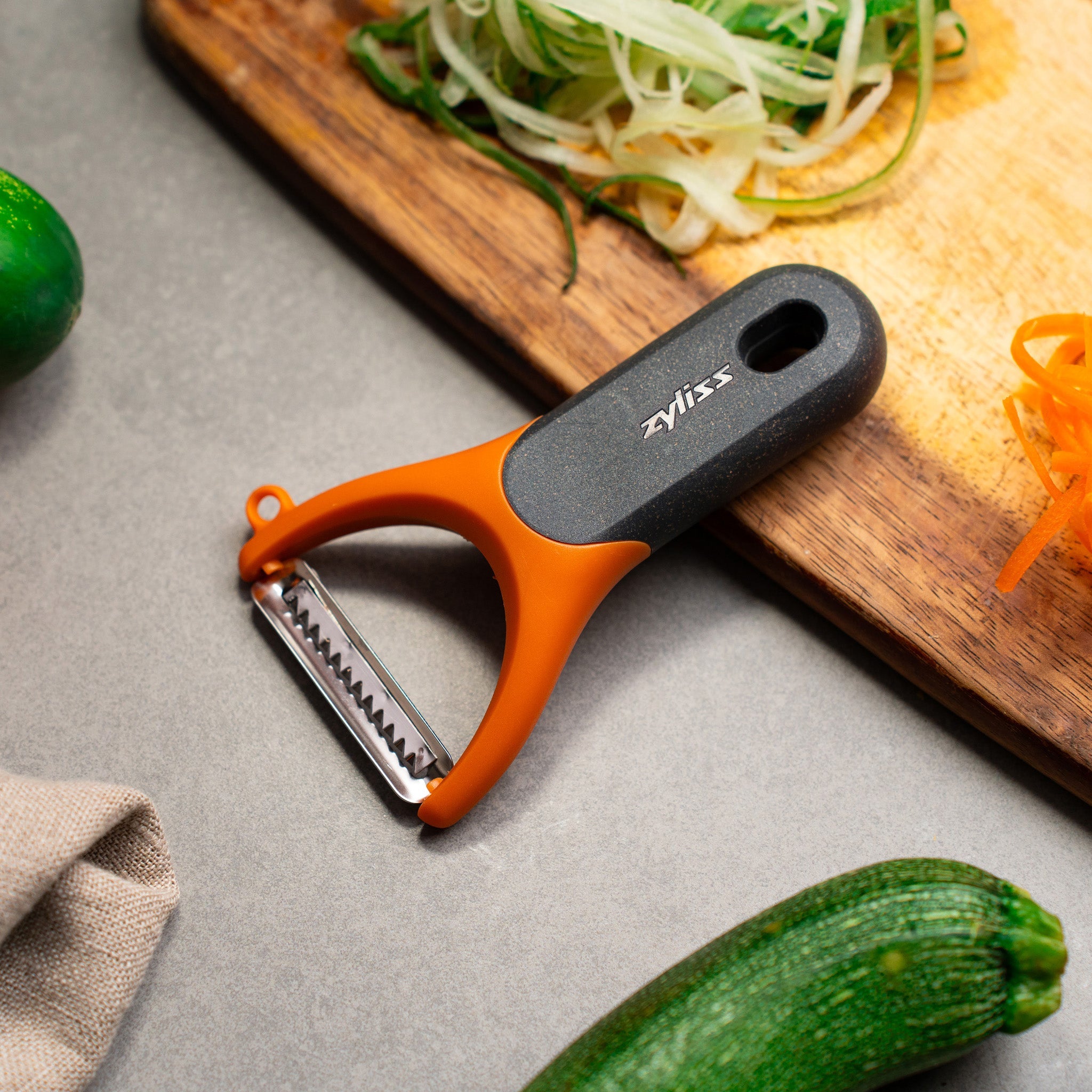 Zyliss Julienne Y Peeler lifestyle - vegetable prep on bench
