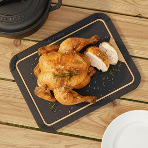 White Magic Eco Basics Carving Board with Juice Groove Black Medium - in use on kitchen bench