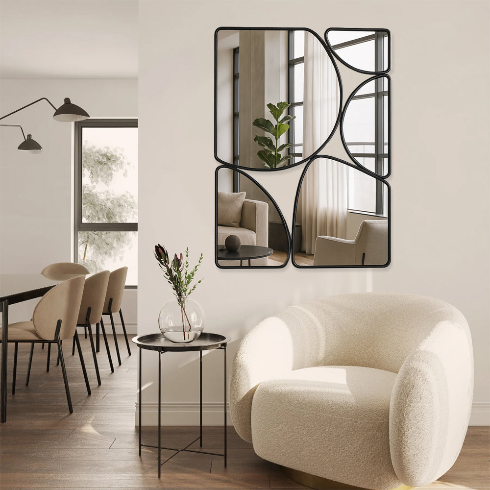 Chiara pebble-cluster mirror styled on a hallway wall