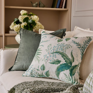 Madras Link Fern Blue Green Cushion 50cm - styled on sofa