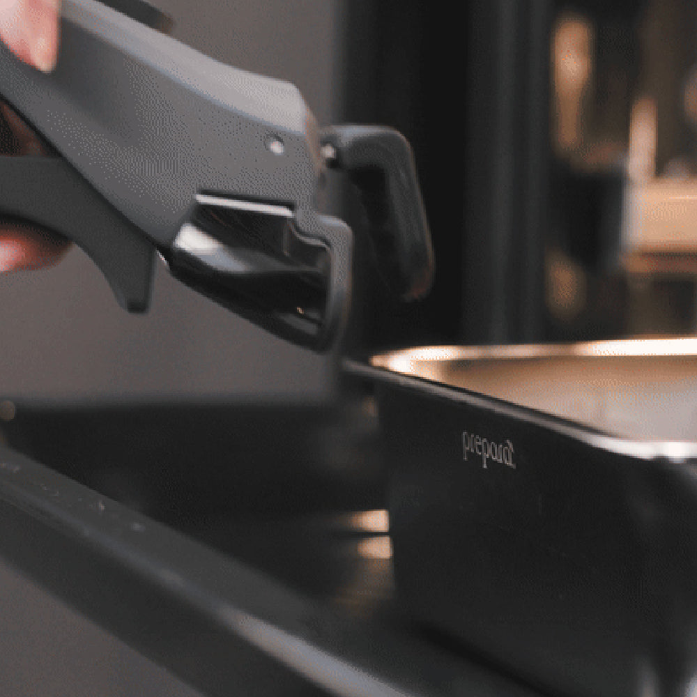 Prepara LIFT handle in use — stainless steel food storage