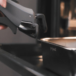 Prepara LIFT handle in use — stainless steel food storage
