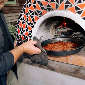 Solidteknics AUS-ION 30cm Bigga Pan in use wrought iron skillet