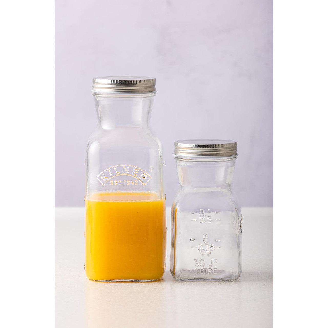 Kilner juice bottle detail — clear capacity markings and one-piece lid