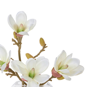 White mini magnolia sphere vase styled on a shelf